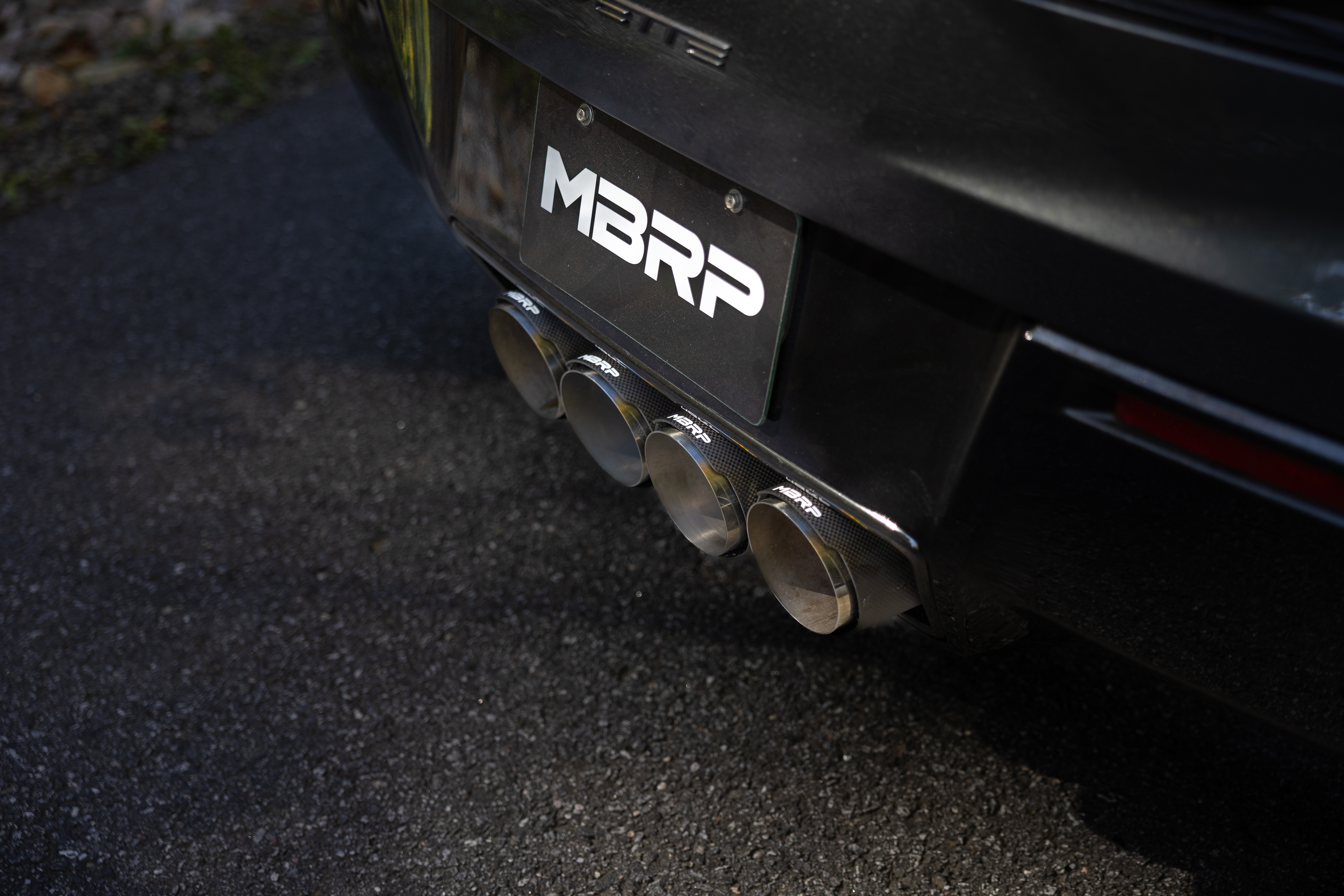 MBRP Exhaust 3in. Axle-Back; Quad Rear With 4.5in. Carbon Fiber Tips, T304, Active